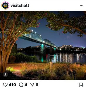 Night time view of the Tennessee River in Chattanooga and the Walnut Street pedestrian bridge spanning the river. 